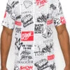 All Over Newspaper Graphic T-Shirts